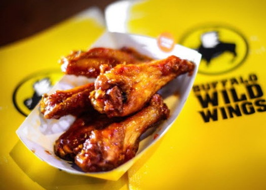 BUFFALO WILD WINGS WILL TEST RESTRUCTURING WITH SALE OF ABOUT 60 COMPANY-OWNED OUTLETS