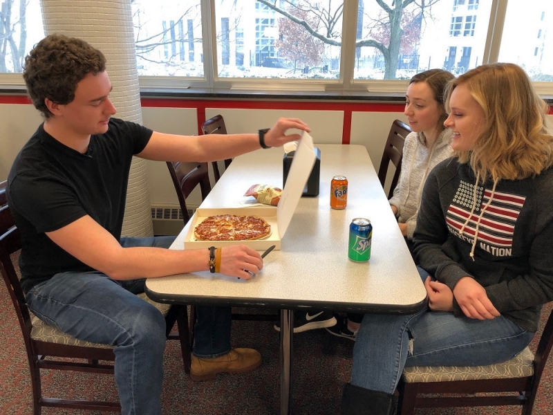 NEW PIZZA VENDING MACHINE SELLS 400 PIES IN A WEEK AT OHIO STATE