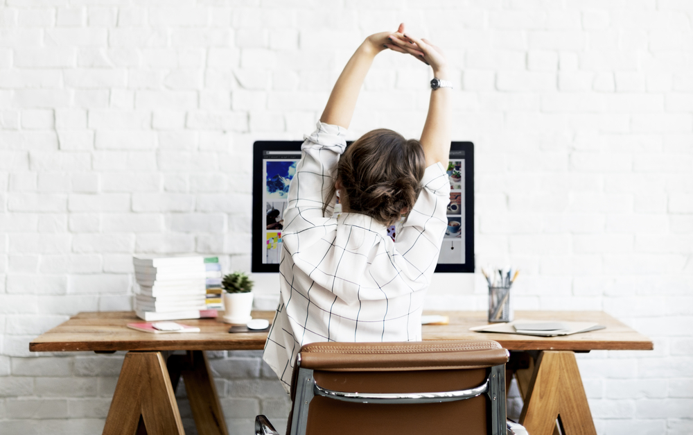 10 Quick Stretches for Anyone Who Sits in a Chair Most of the Day